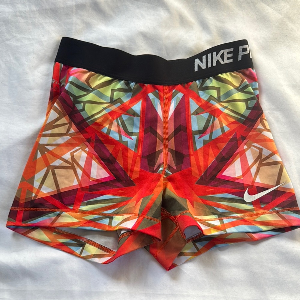 Nike Red and Orange Athletic Shorts with Geometric Design
